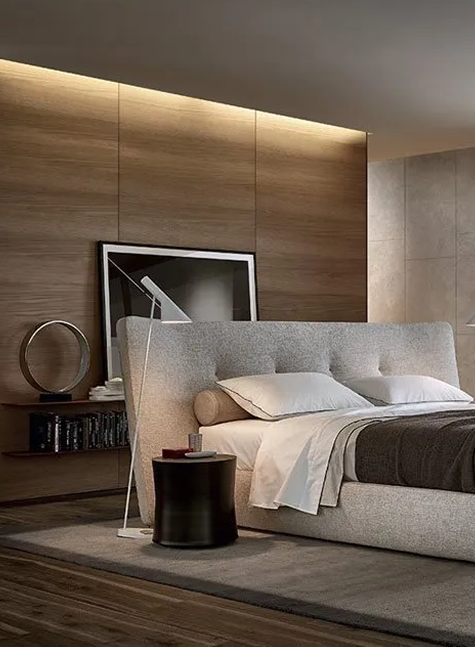 Chambre chaleureuse dans des teintes de gris, marron et bois